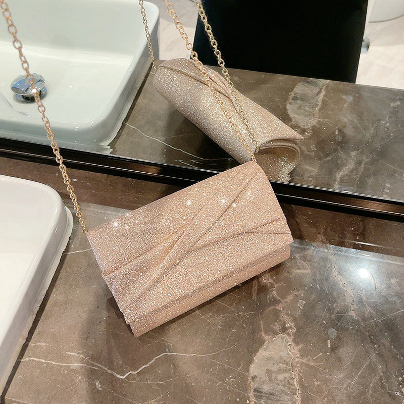 Luvéra Gold Mode Umschlag Clutch