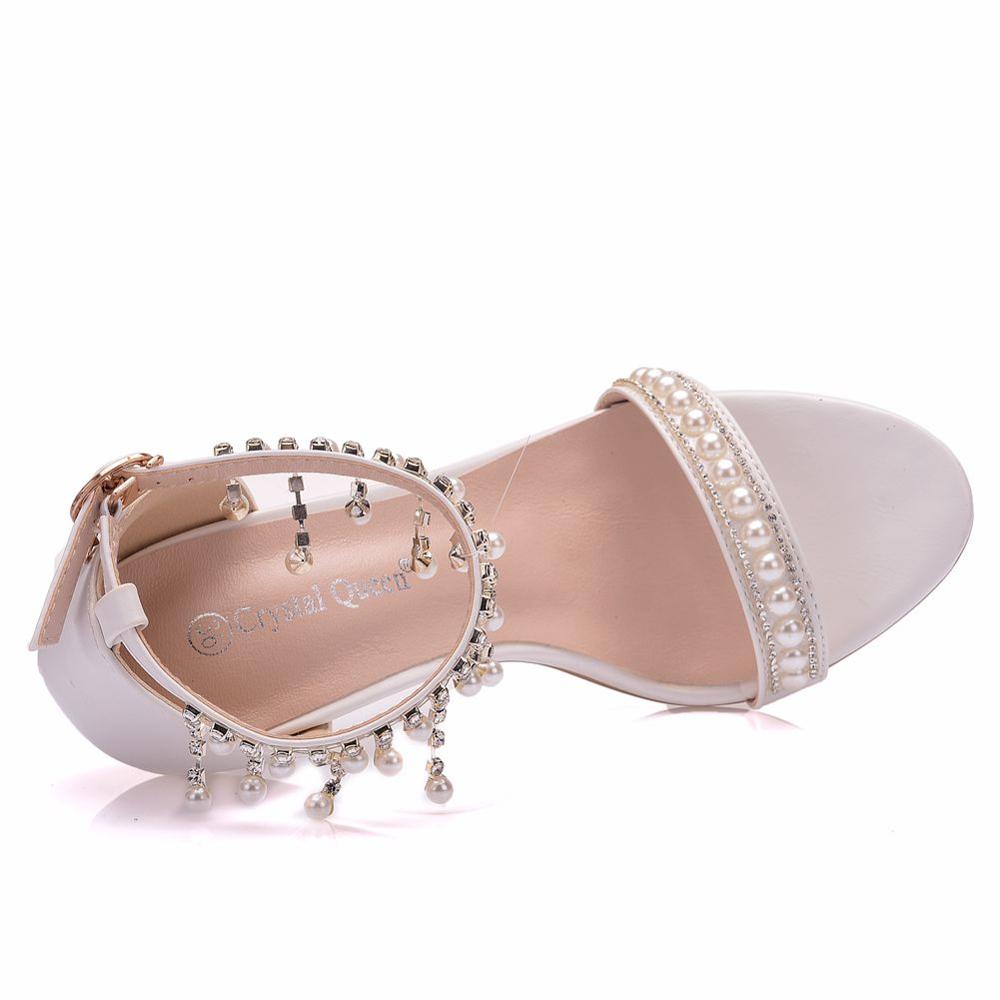 Luvéra Schuhe mit hohen Absätzen und Perlenquasten