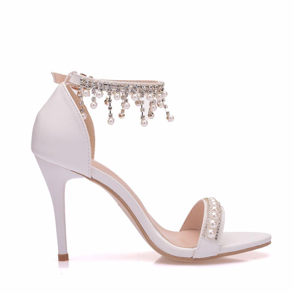 Luvéra Schuhe mit hohen Absätzen und Perlenquasten
