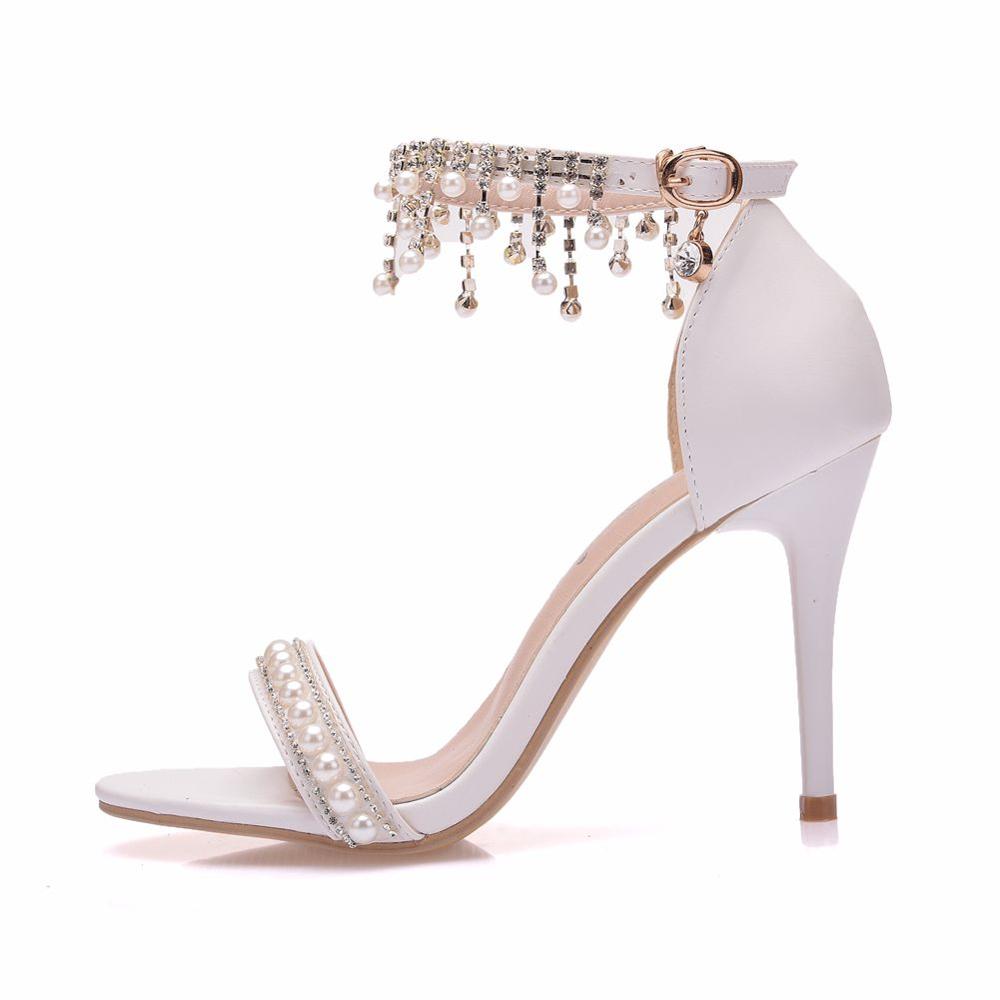 Luvéra Schuhe mit hohen Absätzen und Perlenquasten