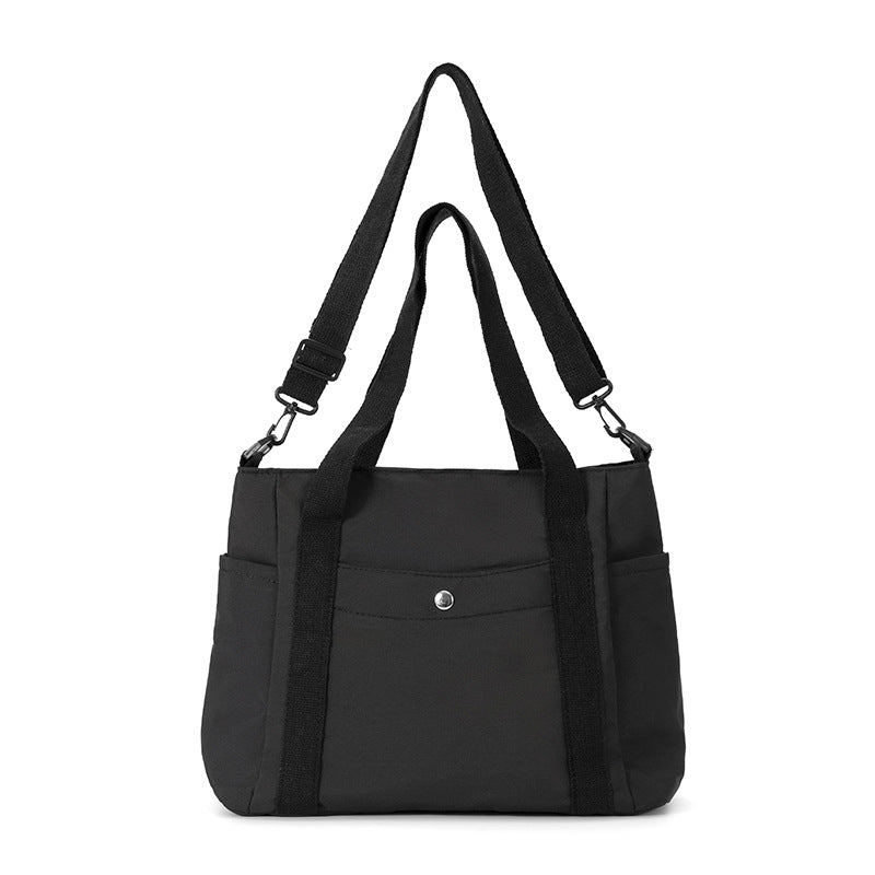 Luvéra Stilvolle Tasche mit hoher Kapazität, die von Hand getragen oder als Umhängetasche getragen werden kann