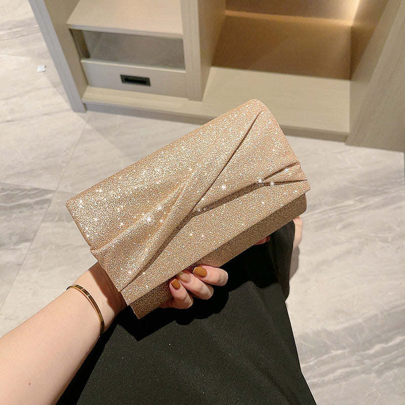 Luvéra Gold Mode Umschlag Clutch