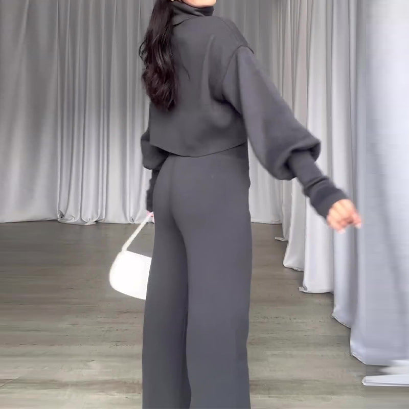 Luvéra Modischer Anzug Grauer Rollkragen-Top mit langen Ärmeln und hoch taillierte Hose