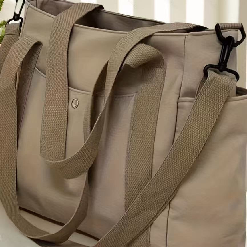 Luvéra Stilvolle Tasche mit hoher Kapazität, die von Hand getragen oder als Umhängetasche getragen werden kann